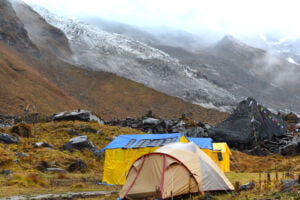 Expedition tents in the Annapurna Base Camp, Himalaya mountains, Nepal in a cloudy day