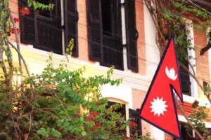 Nepali flag hoisted on the house in bandipur