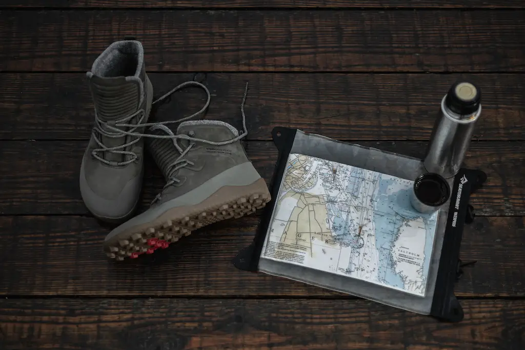 Essential Trekking items such as maps and trekking shoes